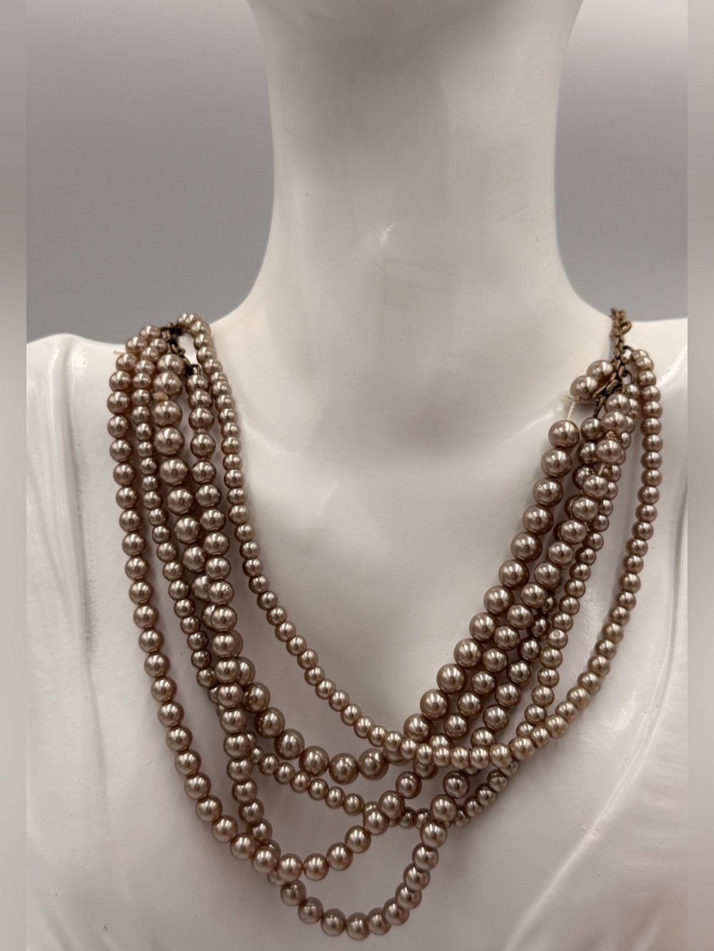 Vintage J. Crew Multi-strand faux pearl necklace in a champagne tone. 3144